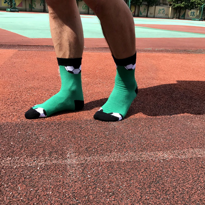 Green football patterned athletic crew socks for men-1