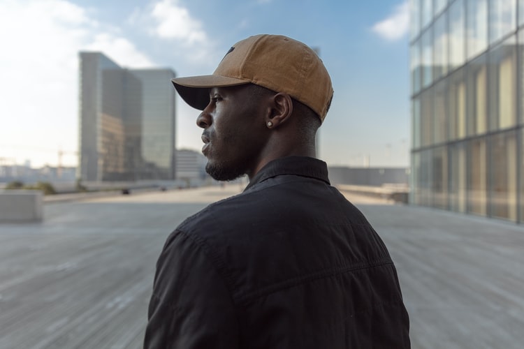 The Trucker hat is the must-have of men's fashion week street style